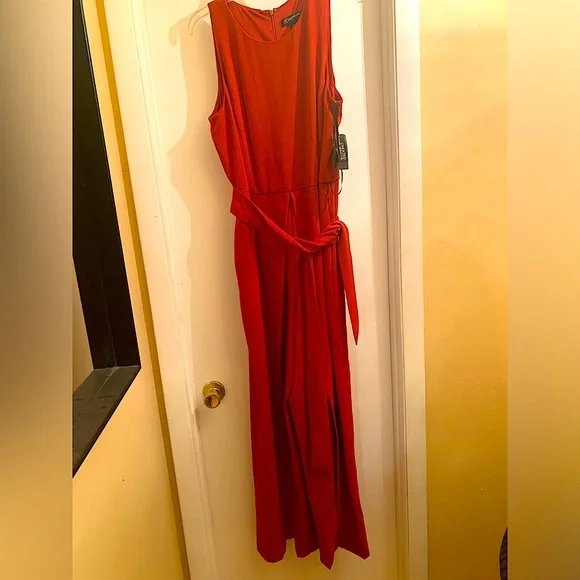 I.N.C. Sleeveless Jumpsuit with belt and pleated front. - Picture 1 of 6